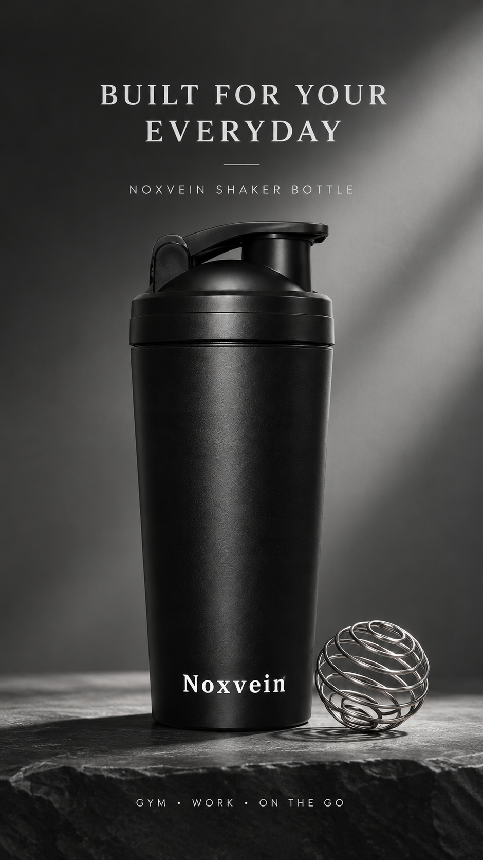 Matte black Noxvein shaker pictured beside a metal mixing ball